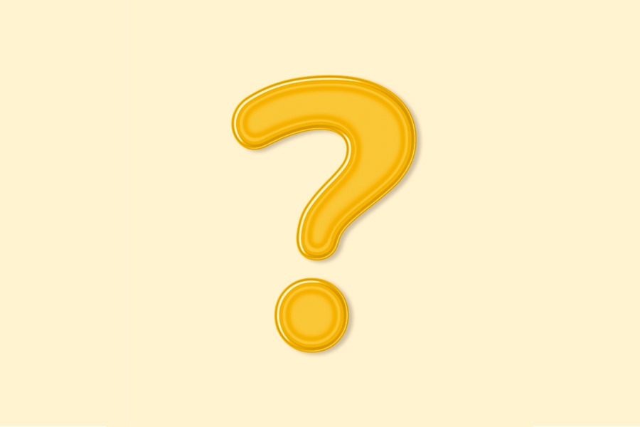 Yellow question mark on a yellow background for questions to ask your child's dentist